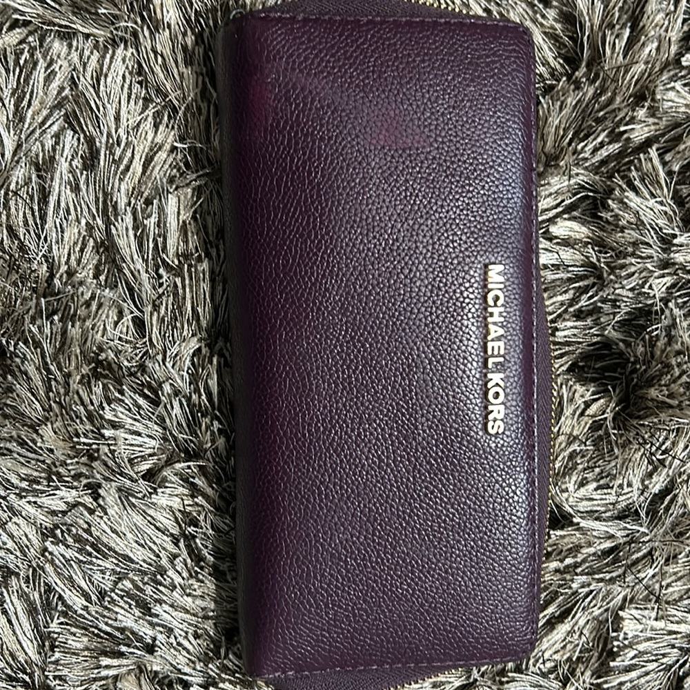 Burgundy Michael Kors wrap around wallet